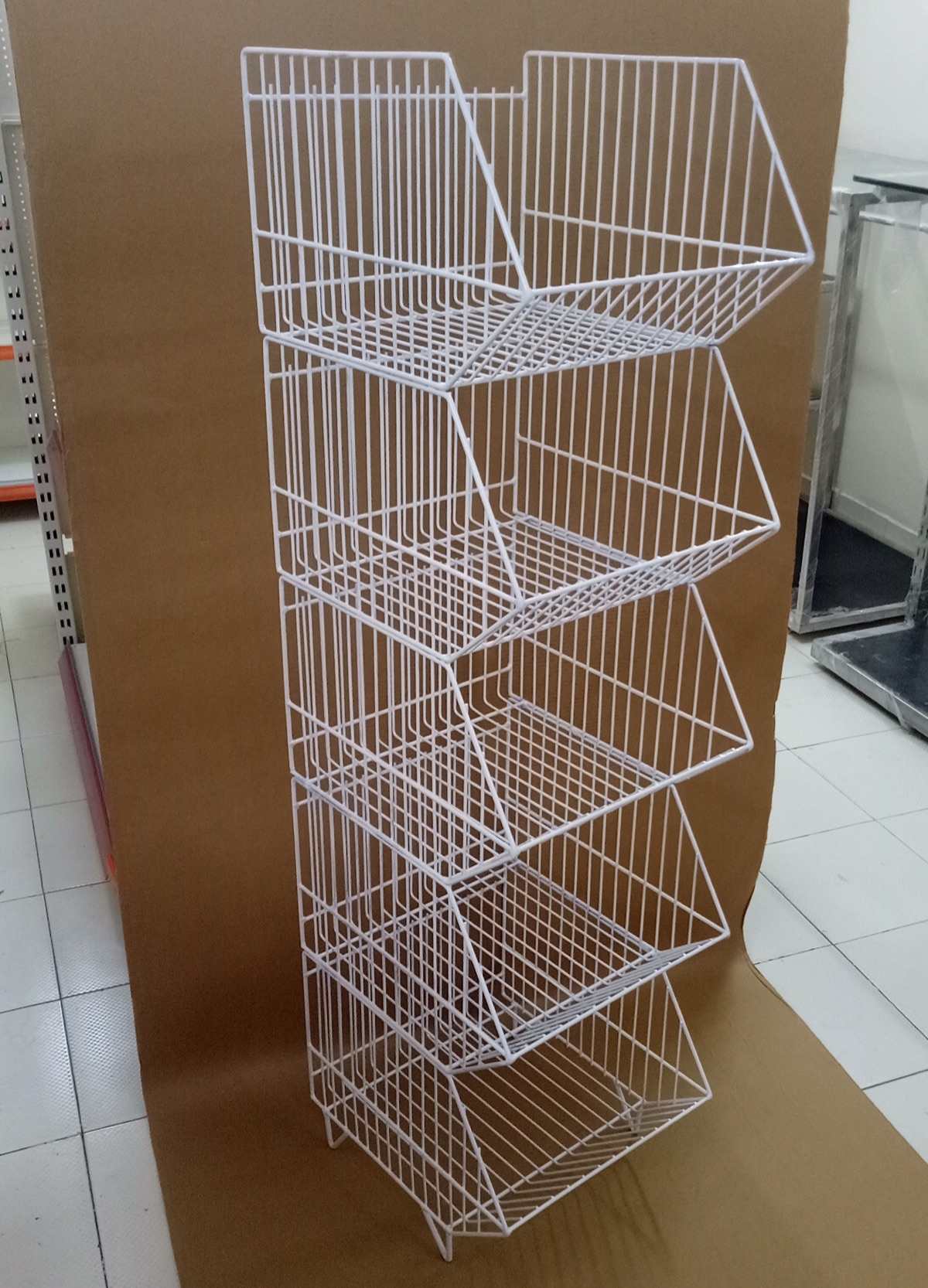Multi-tier wire display rack for packaged snacks.